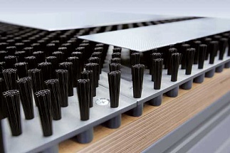 Brushes for supporting sheet metal